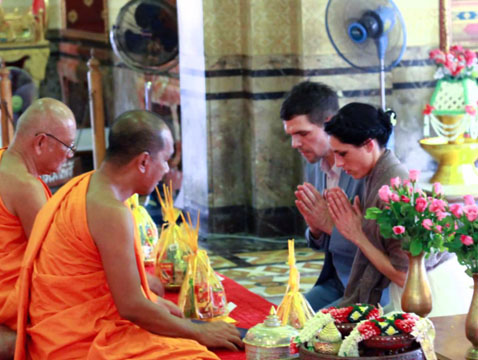 A Buddhist preforming a wedding ceremony